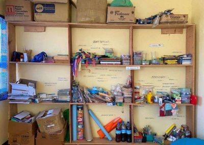 Bandari storage room with school resources on shelves