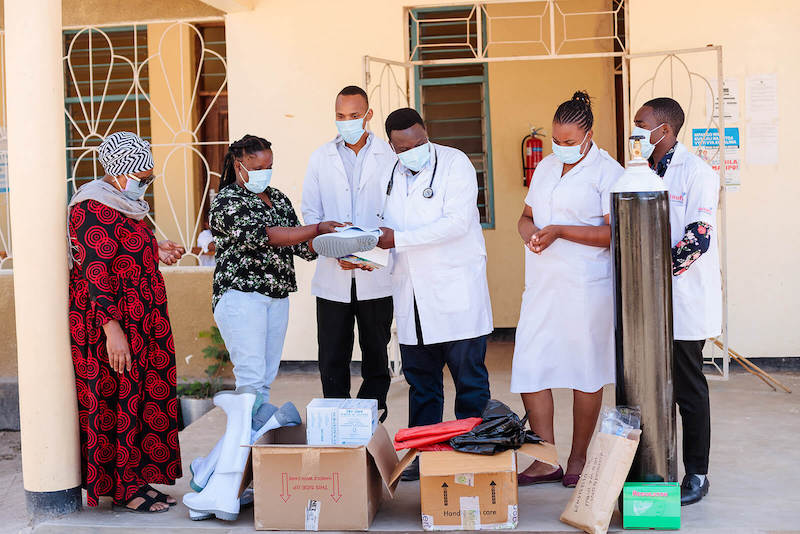 Tanzanian Hospital Staff with Covid-19 Medical supplies